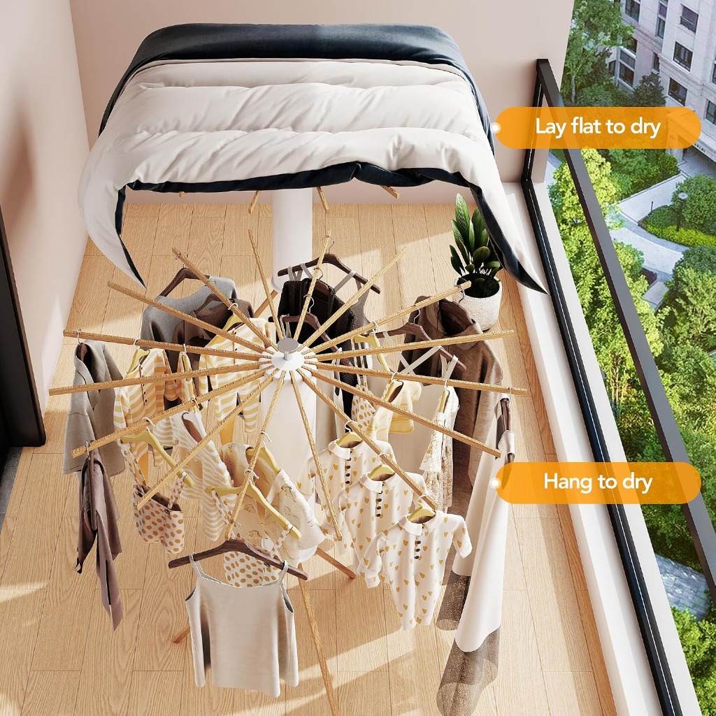 Overhead view showing lay flat drying for heavy duvet on top and hanging clothes below on balcony